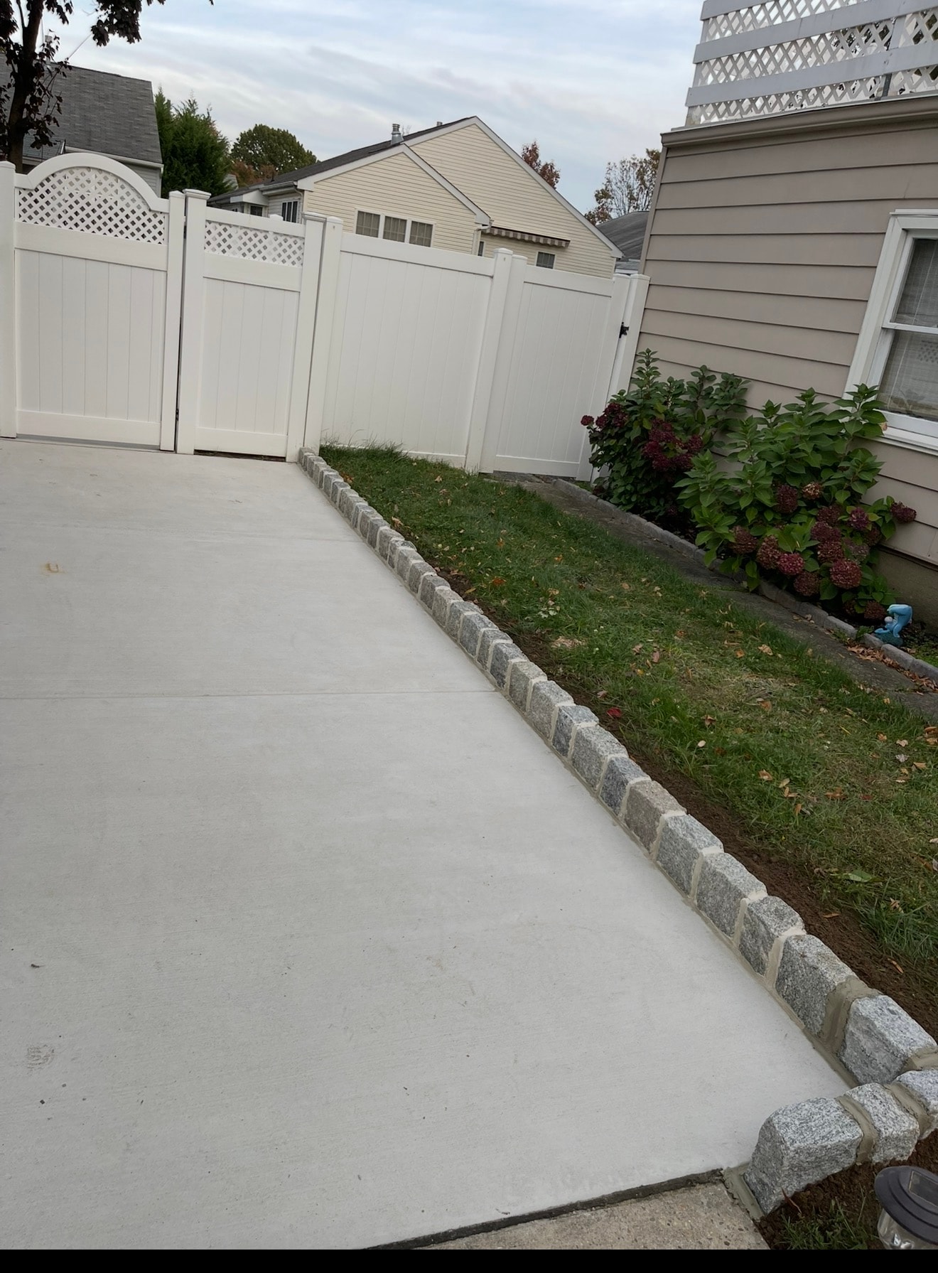 Concrete driveway with granite curbing — South Jersey